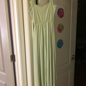 Green and white sleeveless jumpsuit for woman